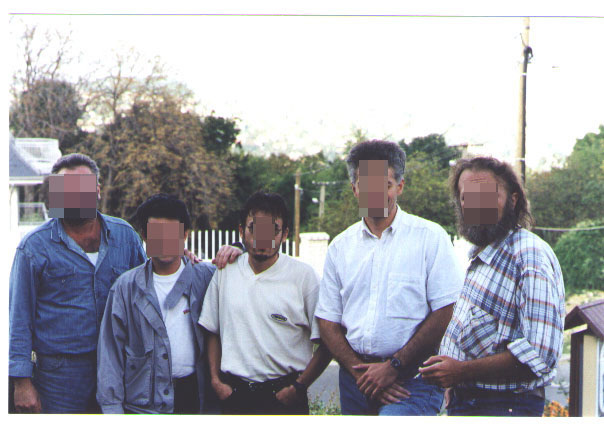 The guy on the left is the driver. I'm on the right. This is either the hotel's yard or the restaurant's.